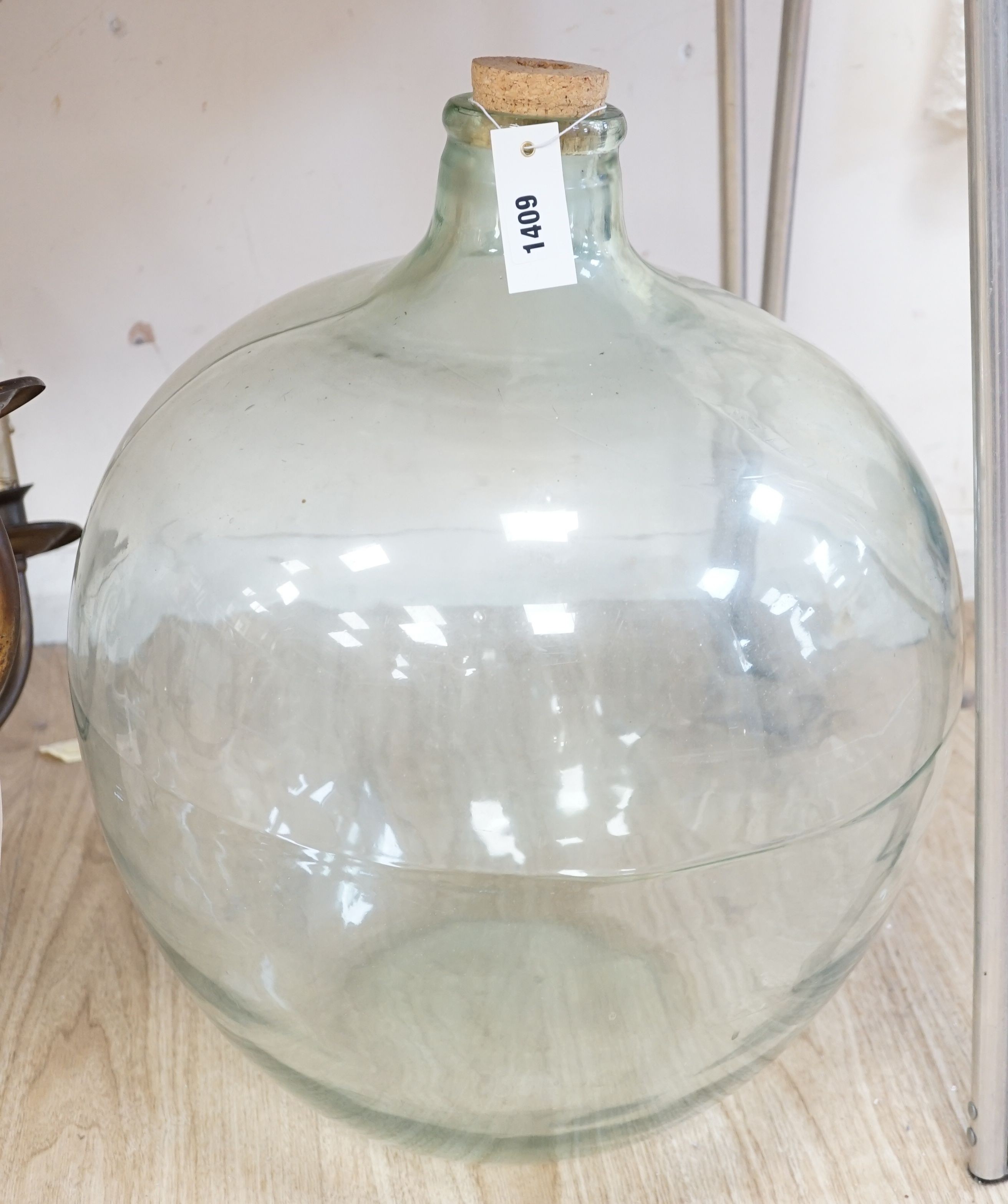 A large moulded glass carboy, approx 57 cms high.